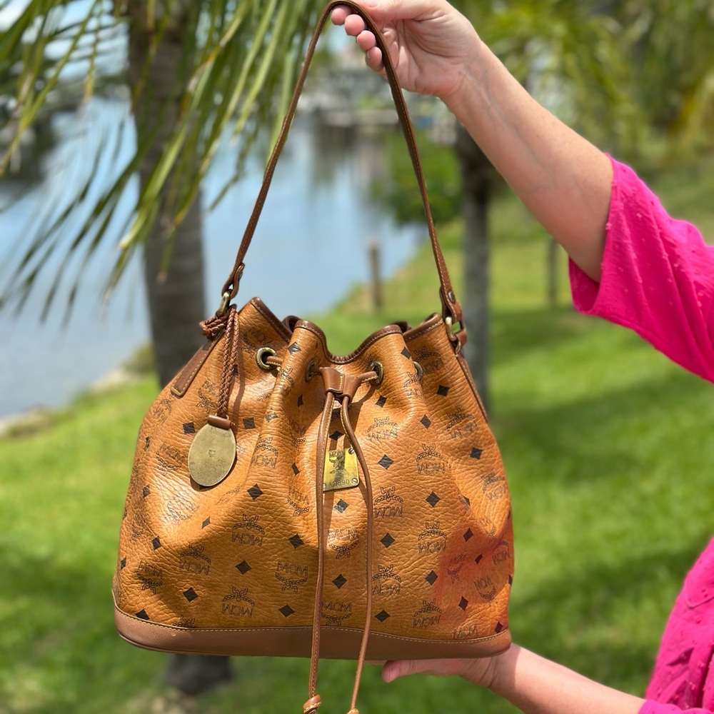 MCM Visetos Cognac Leather Drawstring Bucket Bag – $550 (Authentic, GUC) 🔥